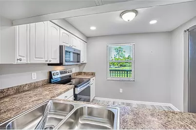 1740 Pine Valley Dr #214, Fort Myers, FL 33907 - Photo 5