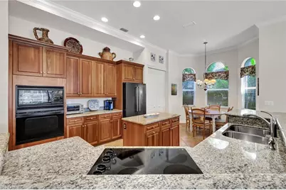 27536 Riverbank Dr, Bonita Springs, FL 34134 - Photo 9