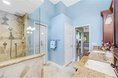 25216 Pelican Creek Cir #201, Bonita Springs, FL 34134 - Photo 19