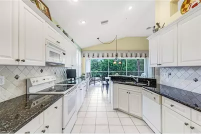 25216 Pelican Creek Cir #201, Bonita Springs, FL 34134 - Photo 9