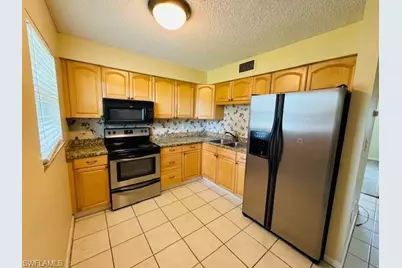 3325 Airport Rd N #L3, Naples, FL 34105 - Photo 1