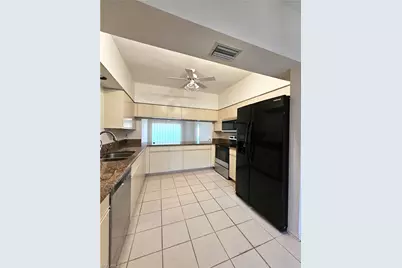 6025 Chardonnay Ln #102, Naples, FL 34119 - Photo 7