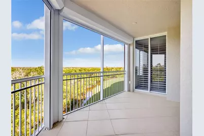 1001 Arbor Lake Dr #202, Naples, FL 34110 - Photo 1
