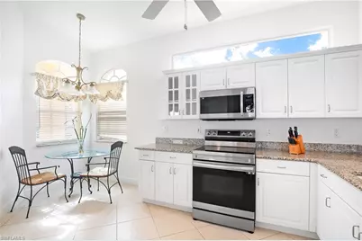 8635 Ibis Cove Cir, Naples, FL 34119 - Photo 7