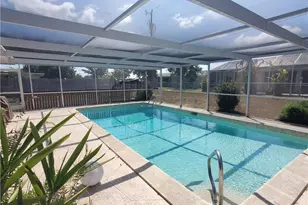 306 Hollywood St, Lehigh Acres, FL 33936 - Photo 1