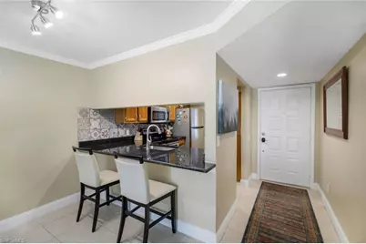 5857 Rattlesnake Hammock Rd #107, Naples, FL 34113 - Photo 5