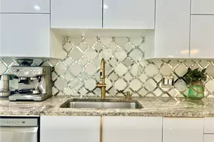 2499 River Reach Dr, Naples, FL 34104 - Photo 11