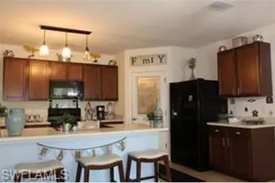 10548 Canal Brook Ln, Lehigh Acres, FL 33936 - Photo 17