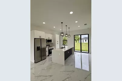 1124 Cherry St E, Lehigh Acres, FL 33974 - Photo 3