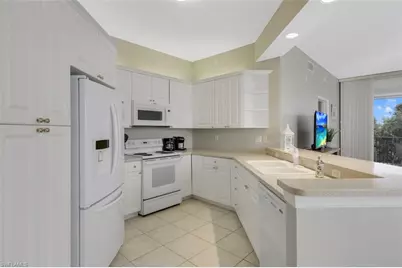 450 Launch Cir #404, Naples, FL 34108 - Photo 7