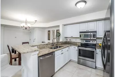 1240 Wildwood Lakes Blvd #104, Naples, FL 34104 - Photo 11