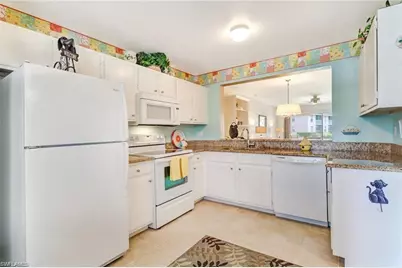 1330 Derbyshire Ct #E103, Naples, FL 34116 - Photo 9