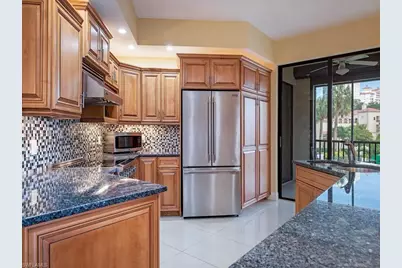 7024 Pelican Bay Blvd #F105, Naples, FL 34108 - Photo 5