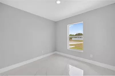 818 Portland St E, Lehigh Acres, FL 33974 - Photo 15