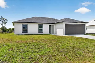 818 Portland St E, Lehigh Acres, FL 33974 - Photo 1