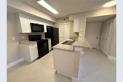 2094 Arbour Walk Cir #3015, Naples, FL 34109 - Photo 5
