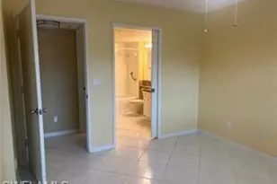 1265 Wildwood Lakes Blvd, Naples, FL 34104 - Photo 9