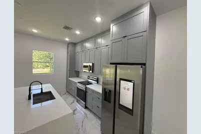 908 Winters St E, Lehigh Acres, FL 33974 - Photo 5