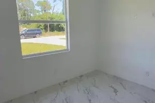 908 Winters St E, Lehigh Acres, FL 33974 - Photo 13