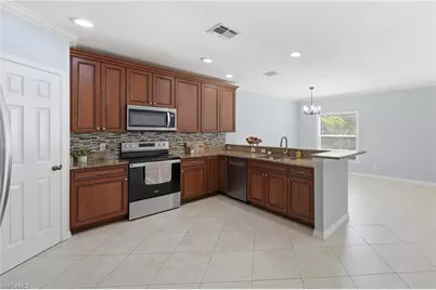 15078 Topsail Ct, Naples, FL 34119 - Photo 7