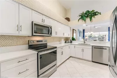 1940 Willow Bend Cir #202, Naples, FL 34109 - Photo 23