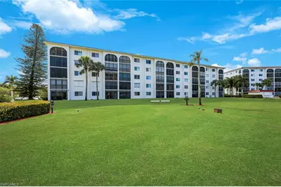29 High Point Cir E #107, Naples, FL 34103 - Photo 1