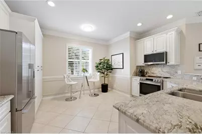 5640 Lago Villaggio Way, Naples, FL 34104 - Photo 7