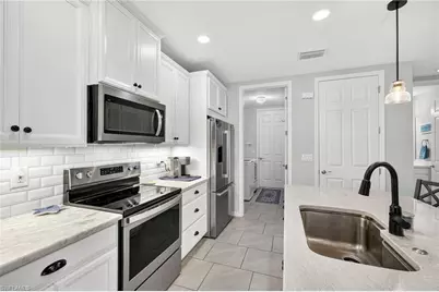 14582 Edgewater Cir, Naples, FL 34114 - Photo 7