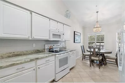 1930 Willow Bend Cir #201, Naples, FL 34109 - Photo 5