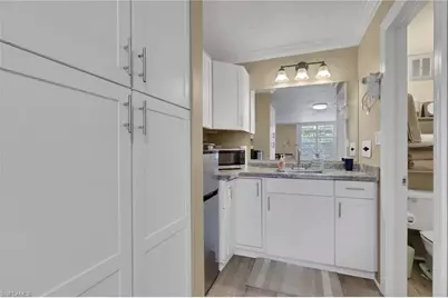 2555 Tamiami Trl N #115, Naples, FL 34103 - Photo 15