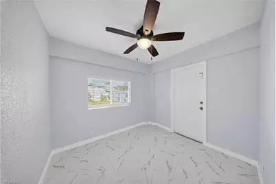 2400 55th Ter SW, Naples, FL 34116 - Photo 9