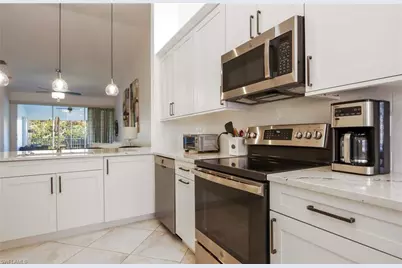 2585 Old Groves Rd #L203, Naples, FL 34109 - Photo 7