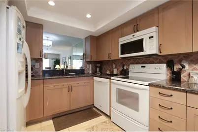 505 Lake Louise Cir #101, Naples, FL 34110 - Photo 9