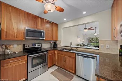 621 Squire Cir #204, Naples, FL 34104 - Photo 3