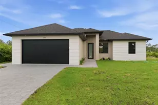 1222 Earnest St E, Lehigh Acres, FL 33974 - Photo 1