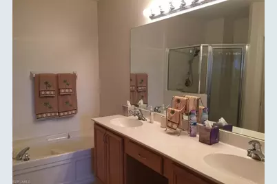 6825 Sterling Greens Dr #102, Naples, FL 34104 - Photo 7