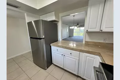5667 Rattlesnake Hamm Rd N #B-301, Naples, FL 34113 - Photo 7