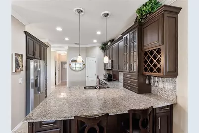 13711 Martone Ct, Estero, FL 33928 - Photo 9