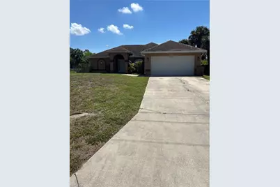 419 Naples Ave S, Lehigh Acres, FL 33974 - Photo 3