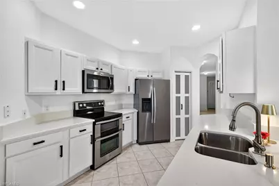 6867 Sterling Greens Dr #101, Naples, FL 34104 - Photo 11