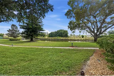 5451 Rattlesnake Hamm Rd #D-108, Naples, FL 34113 - Photo 3