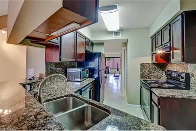 124 Cypress Way E #E5, Naples, FL 34110 - Photo 3