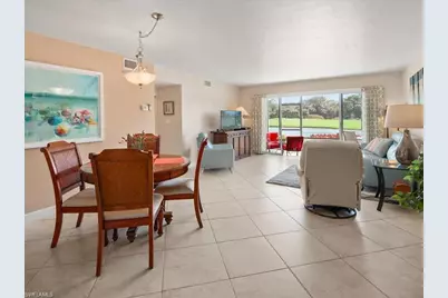 1520 Imperial Golf Course Blvd #211, Naples, FL 34110 - Photo 9