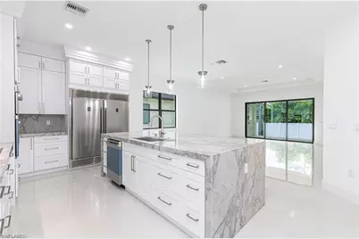 3098 Pine Tree Dr, Naples, FL 34112 - Photo 3