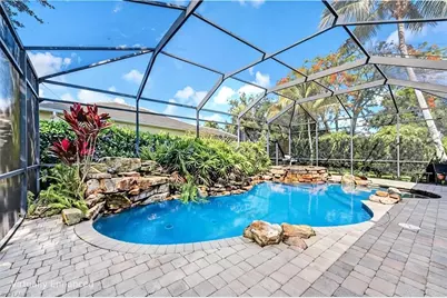 8241 Laurel Lakes Blvd, Naples, FL 34119 - Photo 1