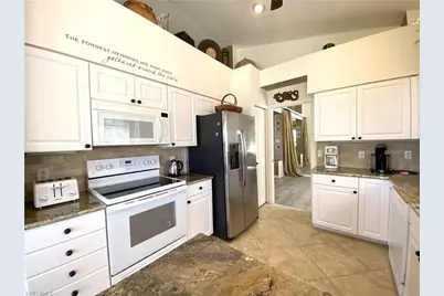 1570 Winding Oaks Way #201, Naples, FL 34109 - Photo 13