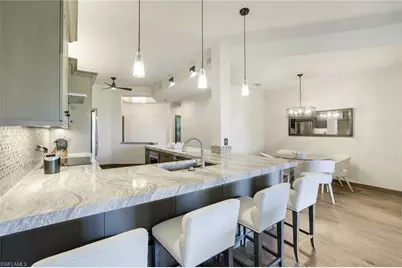 7655 Pebble Creek Cir #404, Naples, FL 34108 - Photo 5