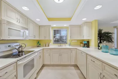 1520 Imperial Golf Course Blvd #214, Naples, FL 34110 - Photo 11