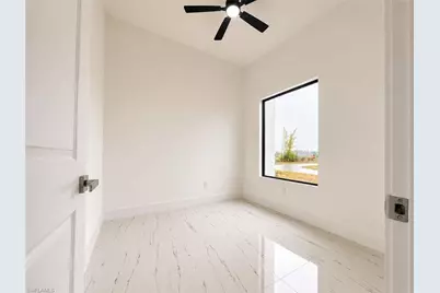 921 Martha Ave S, Lehigh Acres, FL 33974 - Photo 13