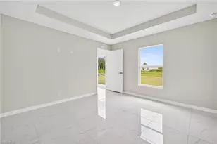 569 Aspen Ave S, Lehigh Acres, FL 33974 - Photo 9